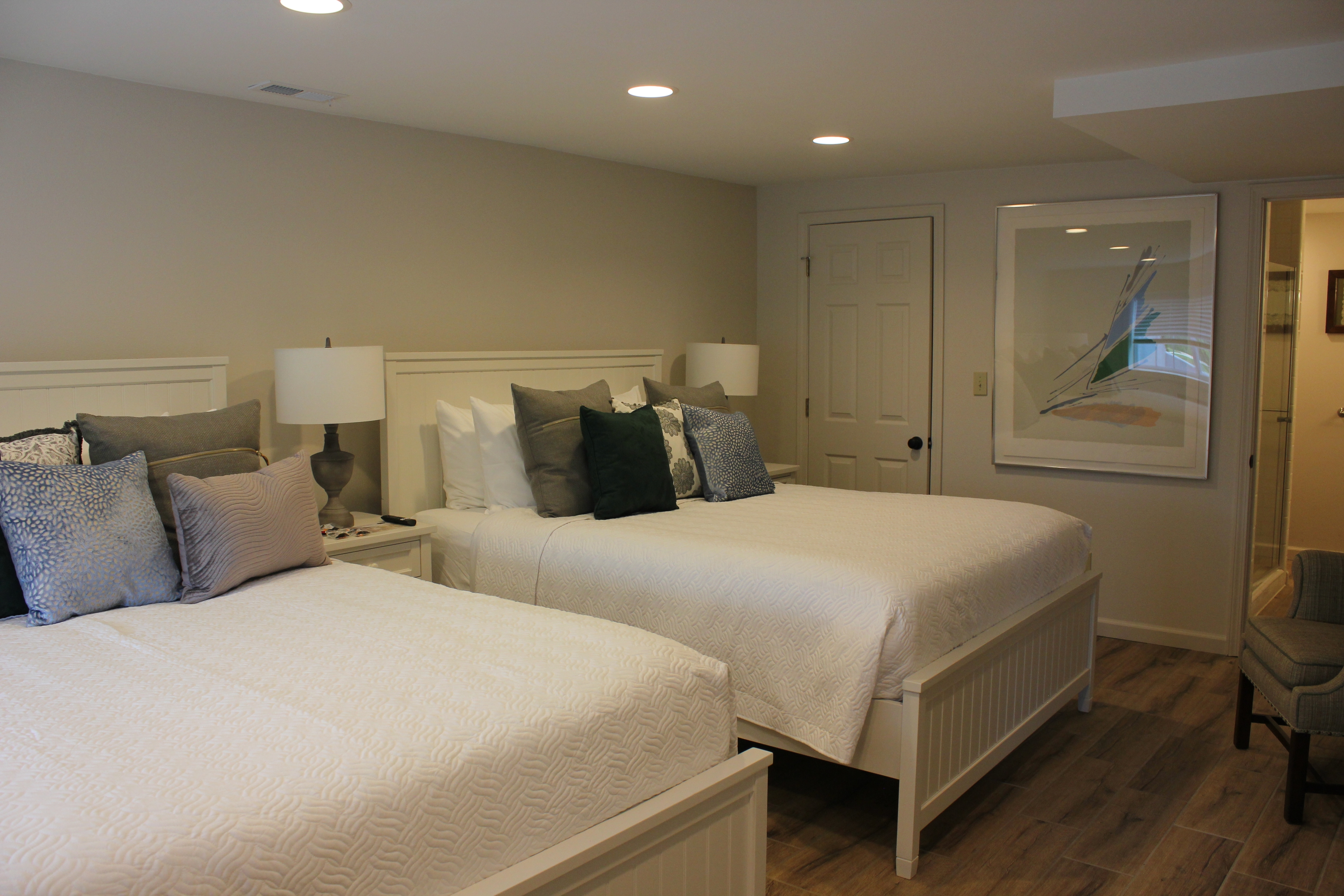 This bedroom has two queen beds and direct access to the unit's bathroom.