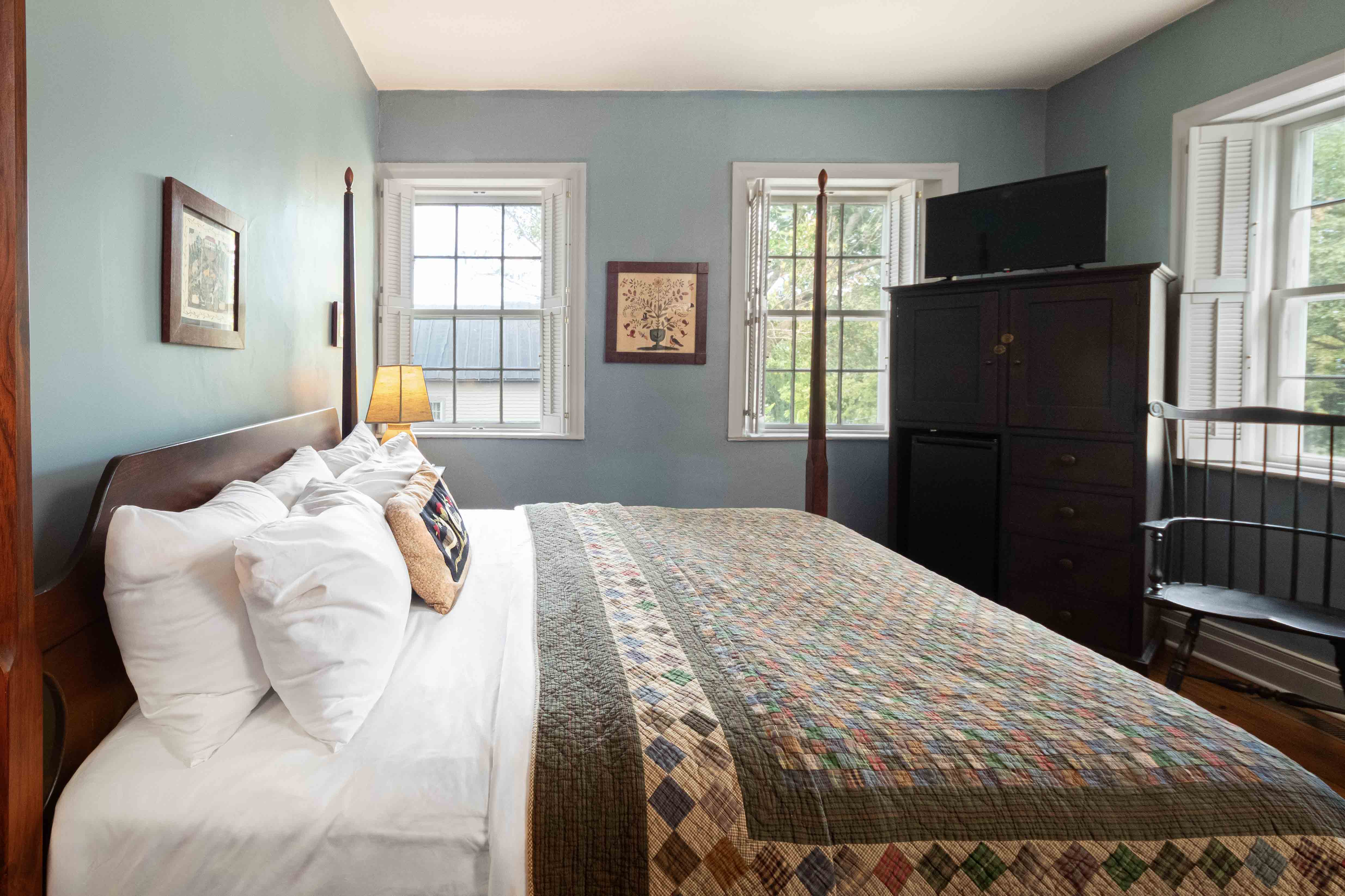 Gustave King bedroom with pencil post bed.